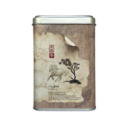 Tea canister with horse and tree design on a textured background