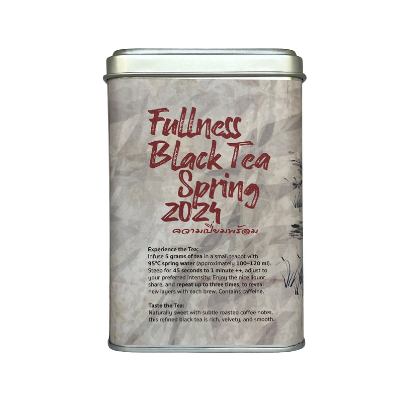 Tea canister with 'Fullness Black Tea Spring 2024' text on a white background
