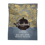 Chaidim Bai Mu Dan White Peony individual teabag front blue gold dragon wave design organic white tea Thailand